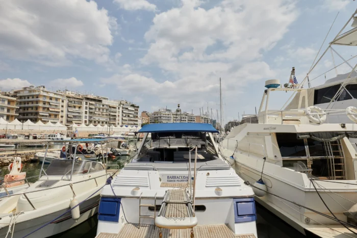 Sunseeker Travado 40 Barracuda docked in marina with city buildings in the background