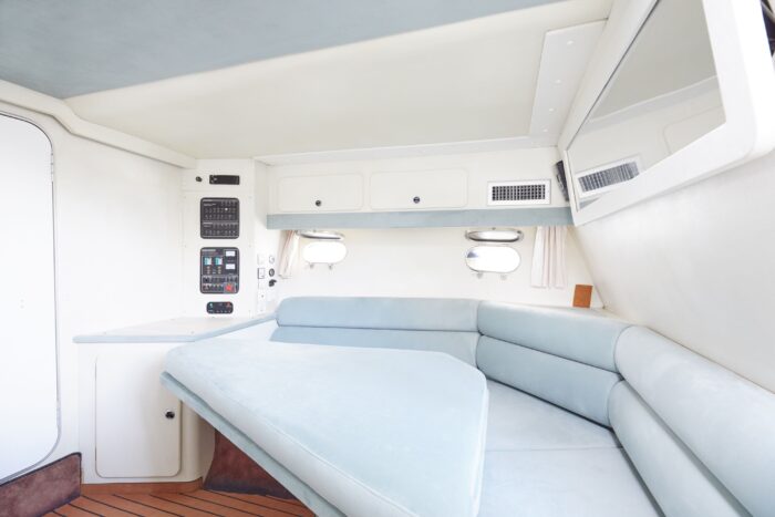 Forward sleeping and lounge area inside Sunseeker Travado 40 Barracuda motorboat